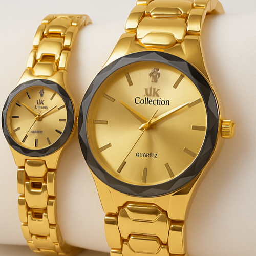 Two gold watches from the ik Collection on a white surface