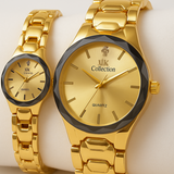 Two gold watches from the ik Collection on a white surface